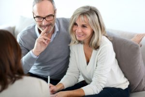 Senior couple meeting financial adviser for investment Senior couple meeting financial adviser for investment