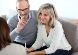 Senior couple meeting financial adviser for investment